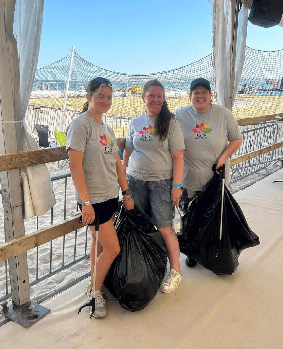 BCS Commercial Cleaning team members at a beachfront event